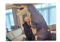 resident with dinosaur